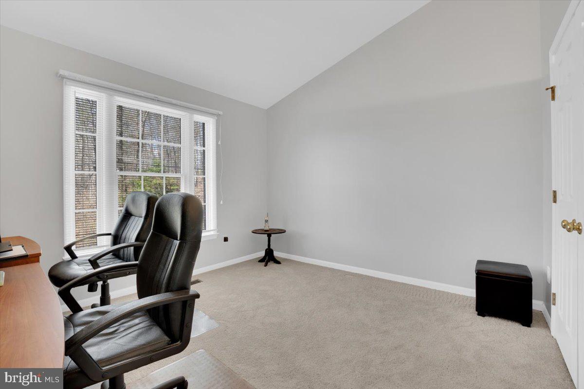 7523 Westmore Drive Springfield, VA 22150 - Photo 23 of 37 a view of a workspace with furniture and a window