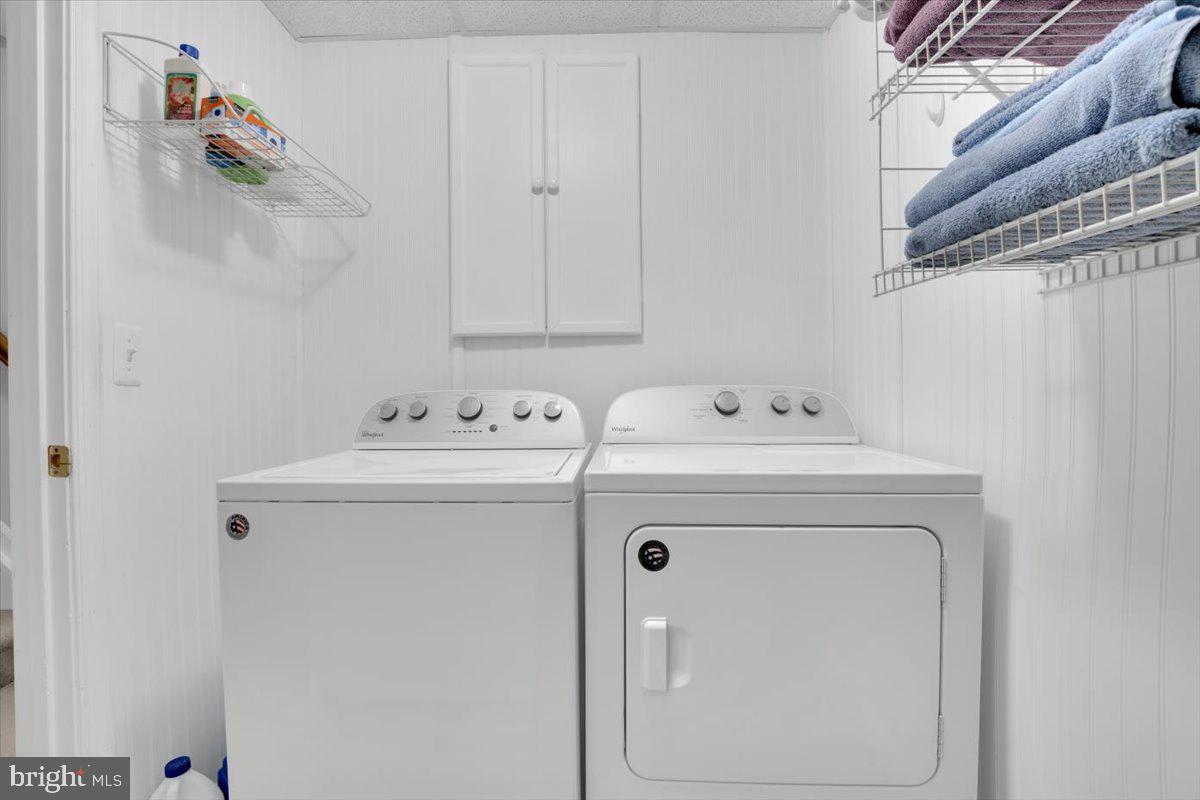 7523 Westmore Drive Springfield, VA 22150 - Photo 31 of 37 a utility room with dryer and washer