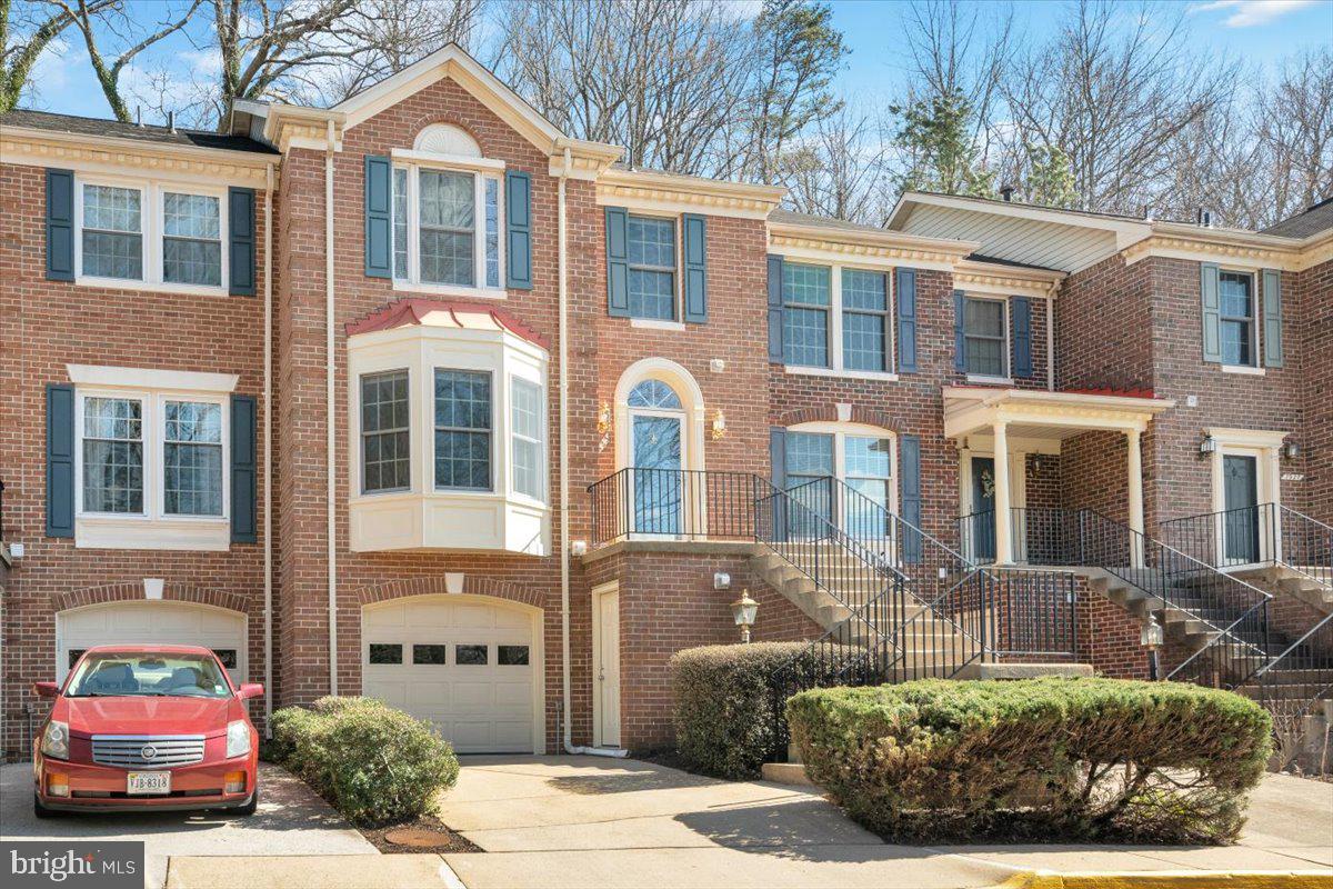 7523 Westmore Drive Springfield, VA 22150 - Photo 33 of 37 a front view of a house with a yard