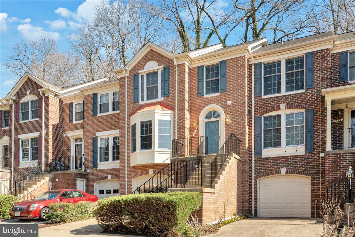 7523 Westmore Drive Springfield, VA 22150 - Photo 34 of 37 a front view of a house with a yard