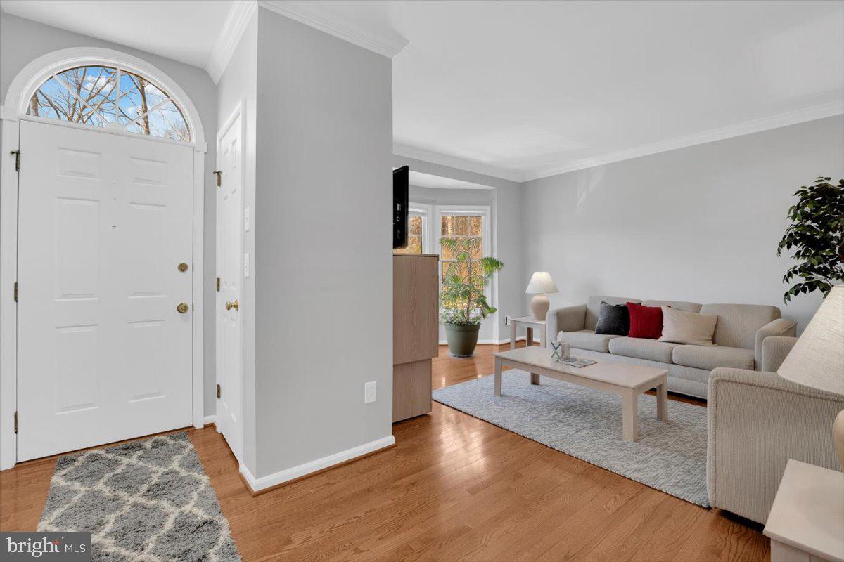 7523 Westmore Drive Springfield, VA 22150 - Photo 4 of 37 a living room with furniture and a window