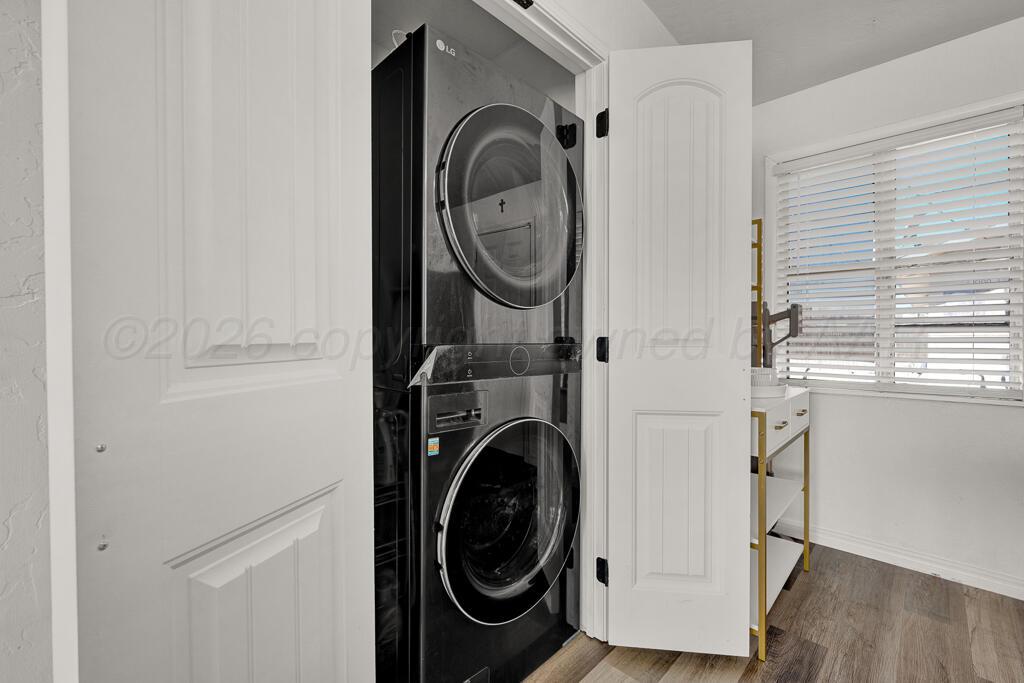 1926 South Highland Street Amarillo, TX 79103 - Photo 8 of 16 a utility room with dryer and washer