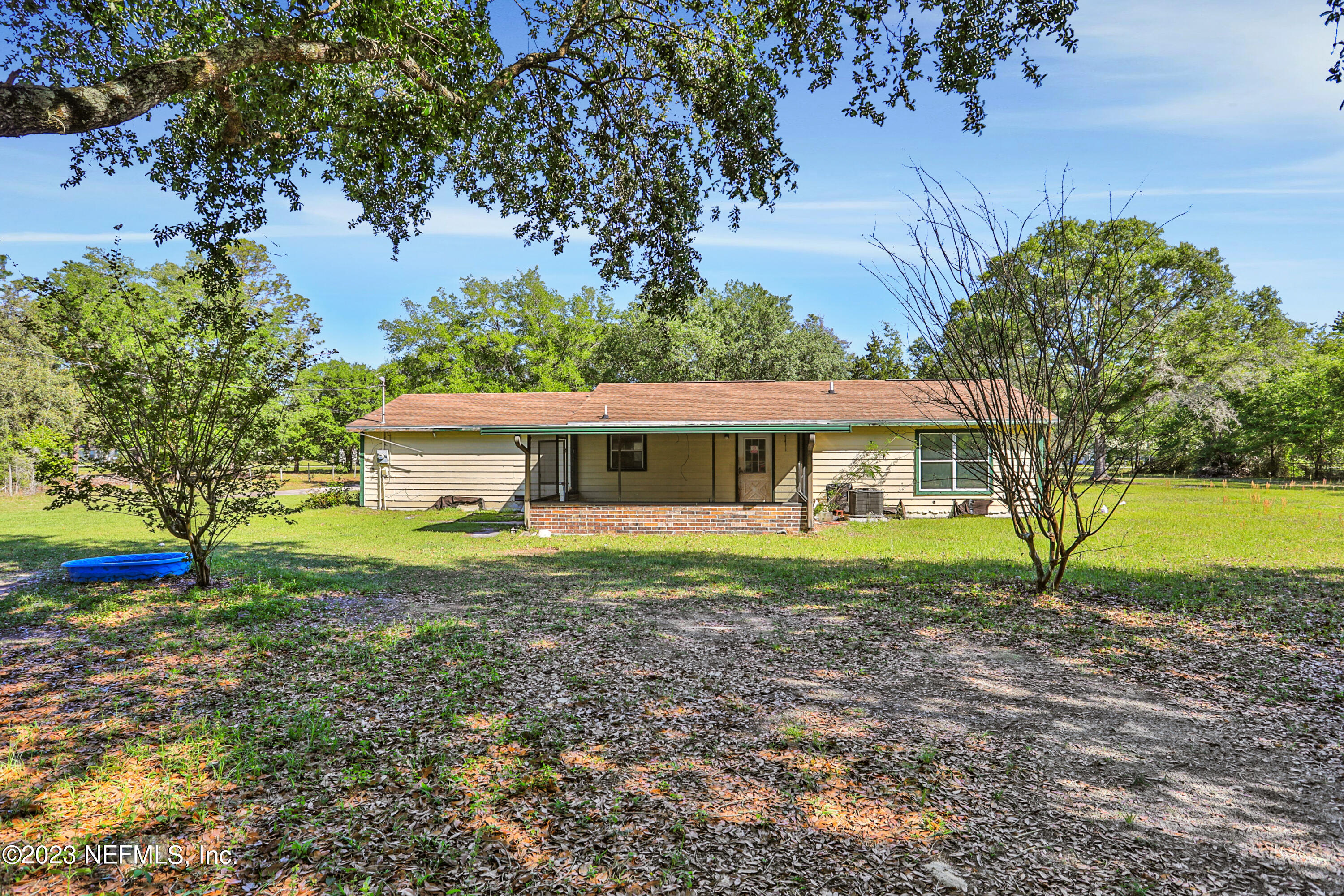4053 Appaloosa Road Middleburg, FL 32068 - Photo 16 of 36 a view of a house with backyard and garden