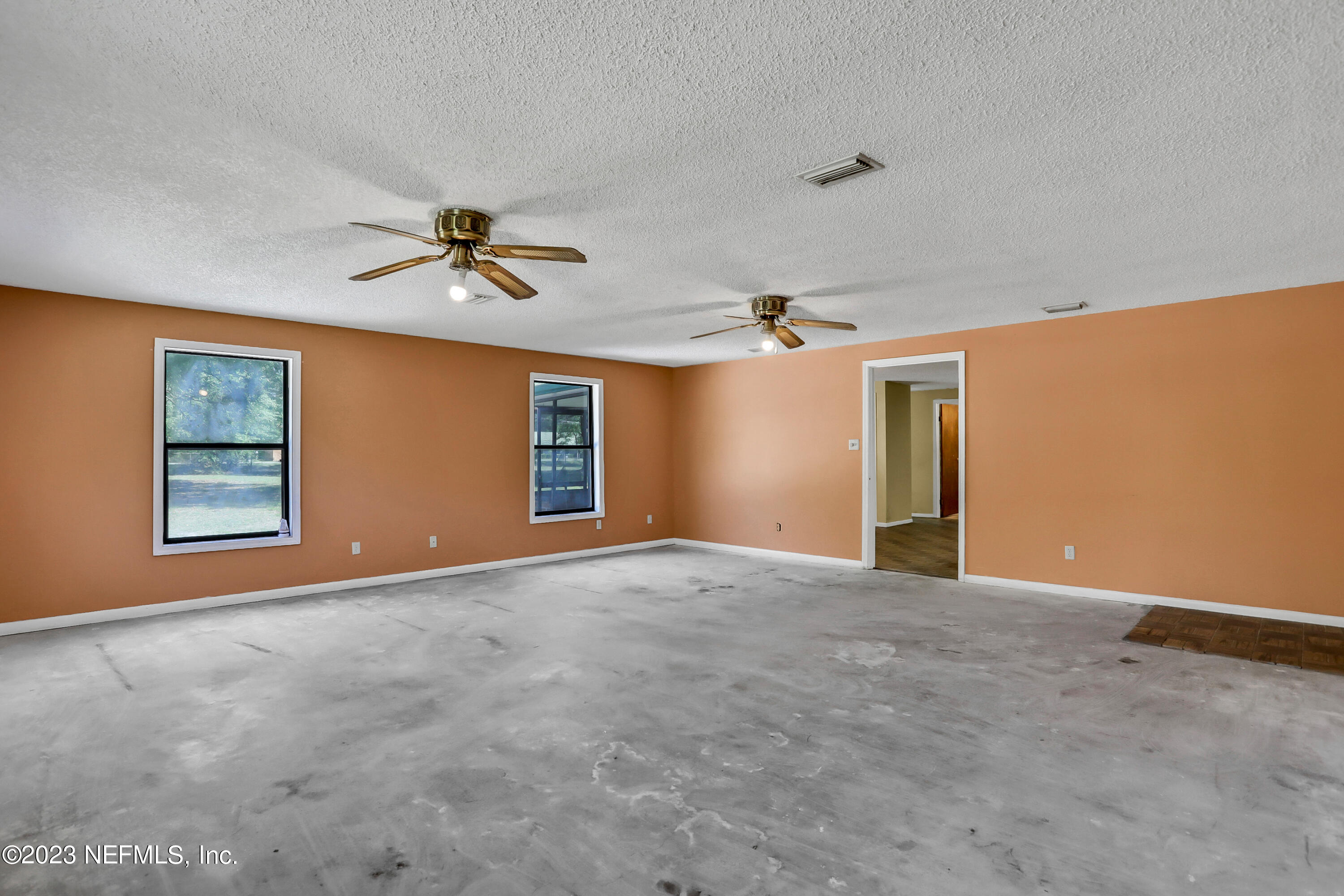 4053 Appaloosa Road Middleburg, FL 32068 - Photo 8 of 36 a view of an empty room with a ceiling fan