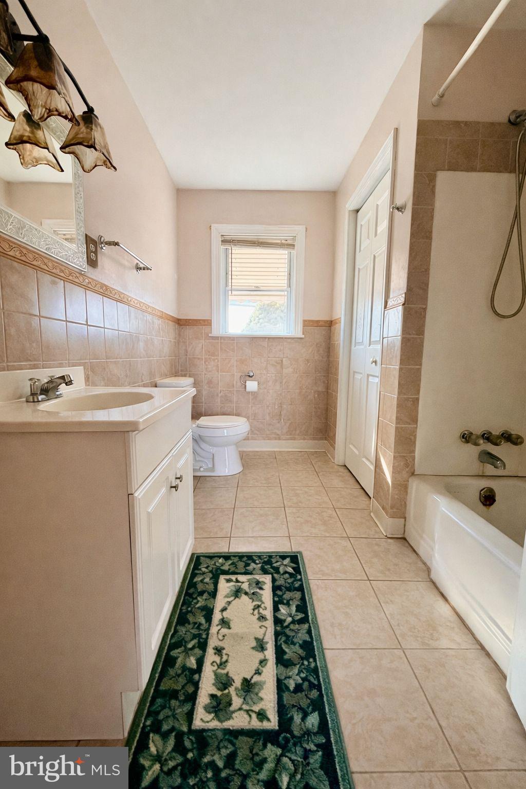 3891 Coseytown Road Greencastle, PA 17225 - Photo 15 of 50 a bathroom with a sink a toilet a mirror and shower