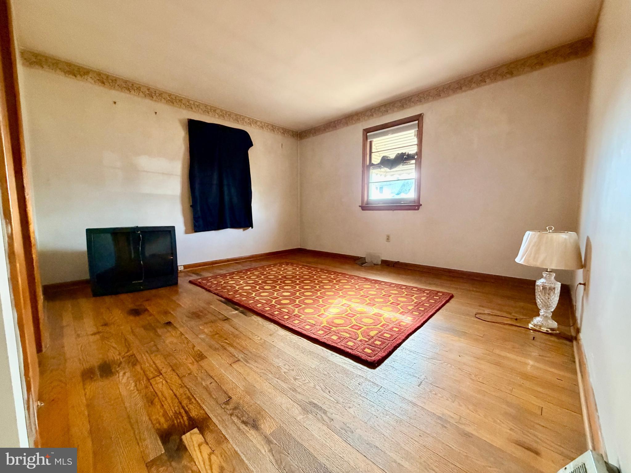 3891 Coseytown Road Greencastle, PA 17225 - Photo 18 of 50 a bedroom with a bed and a window