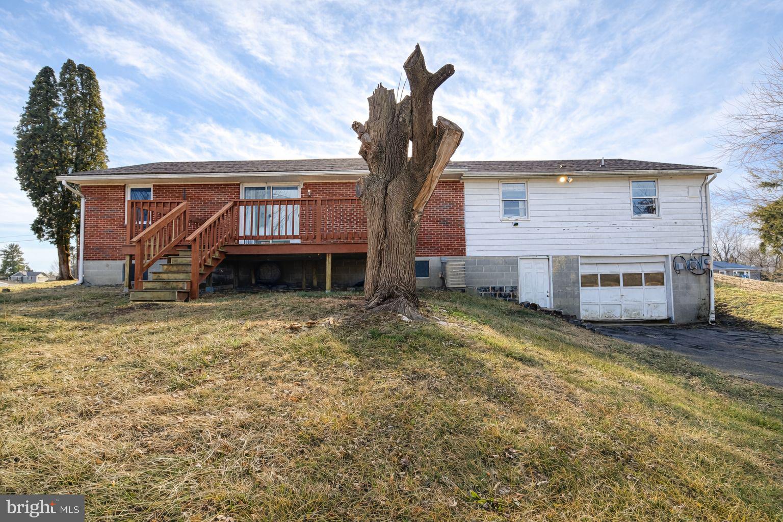 3891 Coseytown Road Greencastle, PA 17225 - Photo 32 of 50 a view of a house with a yard
