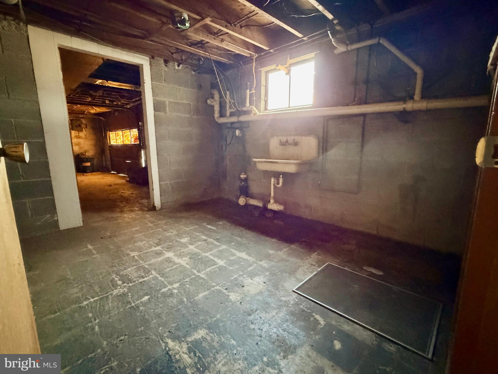 3891 Coseytown Road Greencastle, PA 17225 - Photo 43 of 50 a view of a hallway with wooden shelves