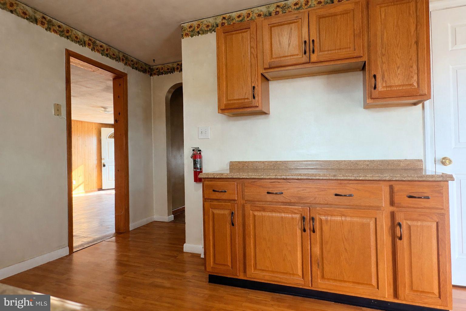 3891 Coseytown Road Greencastle, PA 17225 - Photo 9 of 50 a view of cabinets and wooden floor