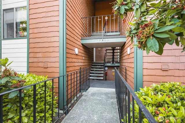 a view of a pathway besides a house