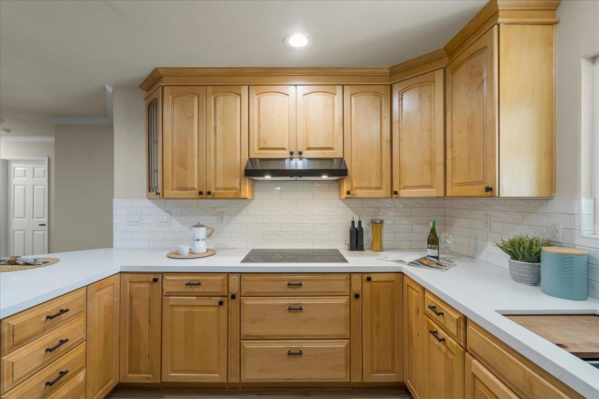 6535 Kings Place Gilroy, CA 95020 - Photo 11 of 25 a kitchen with stainless steel appliances granite countertop white cabinets sink and dishwasher