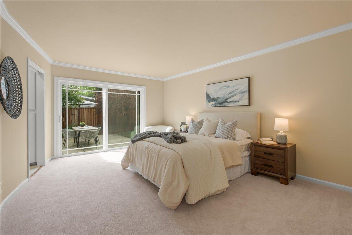 6535 Kings Place Gilroy, CA 95020 - Photo 14 of 25 a spacious bedroom with a bed and a large window
