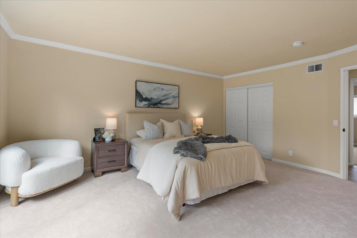 6535 Kings Place Gilroy, CA 95020 - Photo 15 of 25 a bedroom with bed and a couch