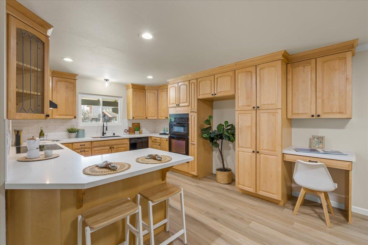 6535 Kings Place Gilroy, CA 95020 - Photo 8 of 25 a kitchen with a refrigerator a sink and a cabinets