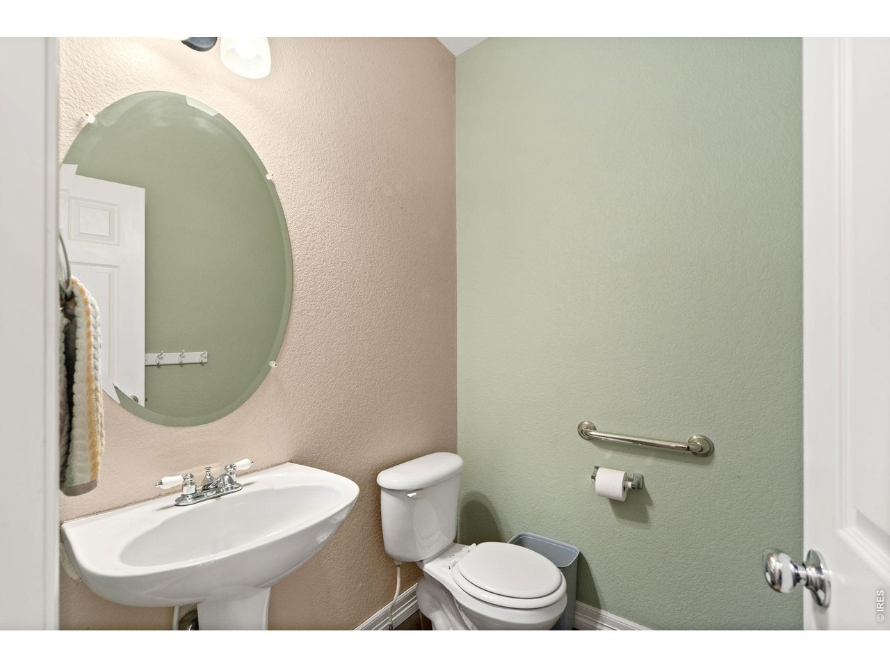 639 Americana Road Longmont, CO 80504 - Photo 34 of 50 Main level half bathroom