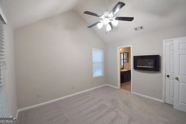 a view of a livingroom with a flat screen tv