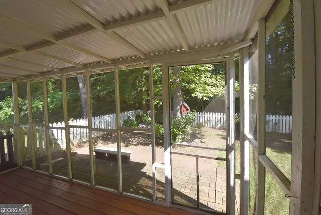 a view of backyard with green space