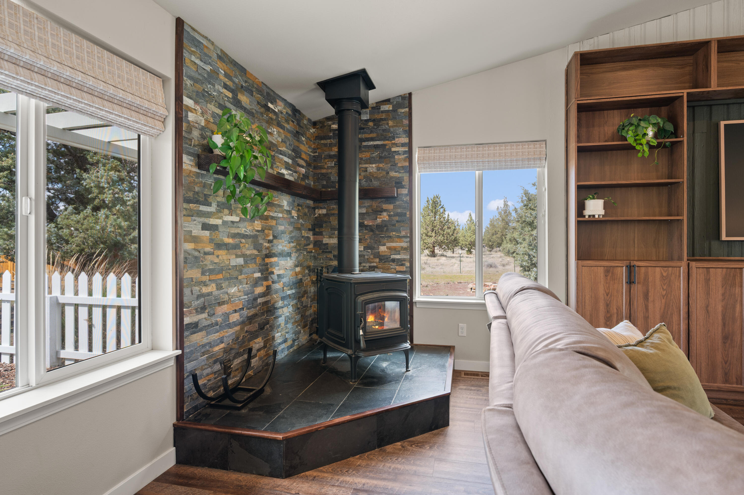 16625 Southwest Dove Road Terrebonne, OR 97760 - Photo 10 of 50 a living room with furniture large window and a fireplace