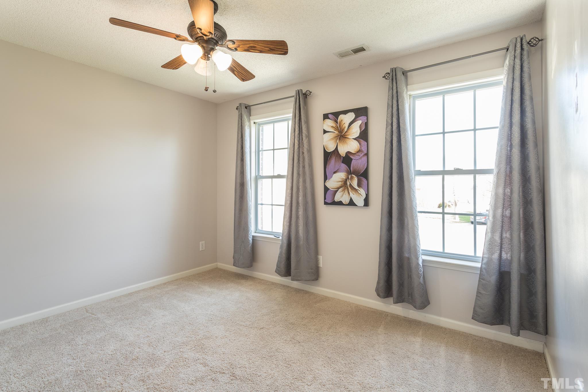 4900 Goosedown Court Raleigh, NC 27604 - Photo 34 of 41 One of three generously sized guest bedrooms located on the second floor.