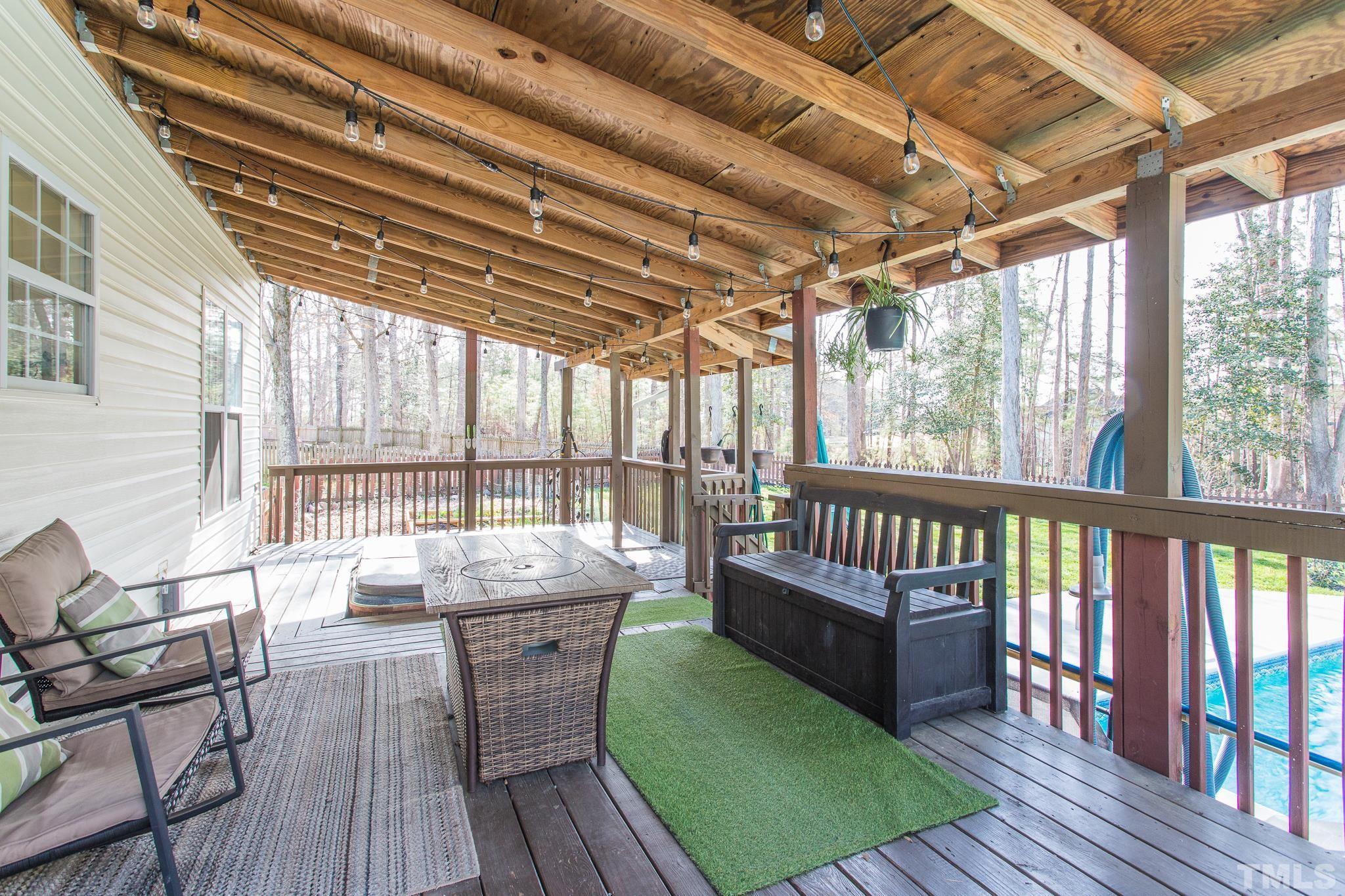 4900 Goosedown Court Raleigh, NC 27604 - Photo 10 of 41 Enjoy peaceful evenings as you sit on your deck overlooking your beautiful backyard and fruit trees.