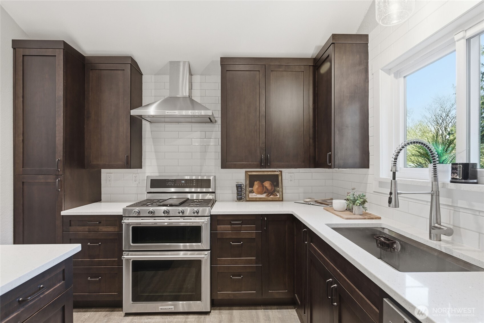 13011 Seattle Hill Road Snohomish, WA 98296 - Photo 7 of 40 a kitchen with a stove and a sink