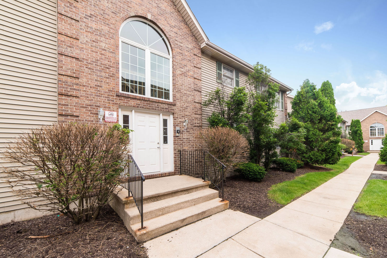 434 South Peace Road, Unit 434 Sycamore, IL 60178 - Photo 3 of 22 a front view of a house with garden