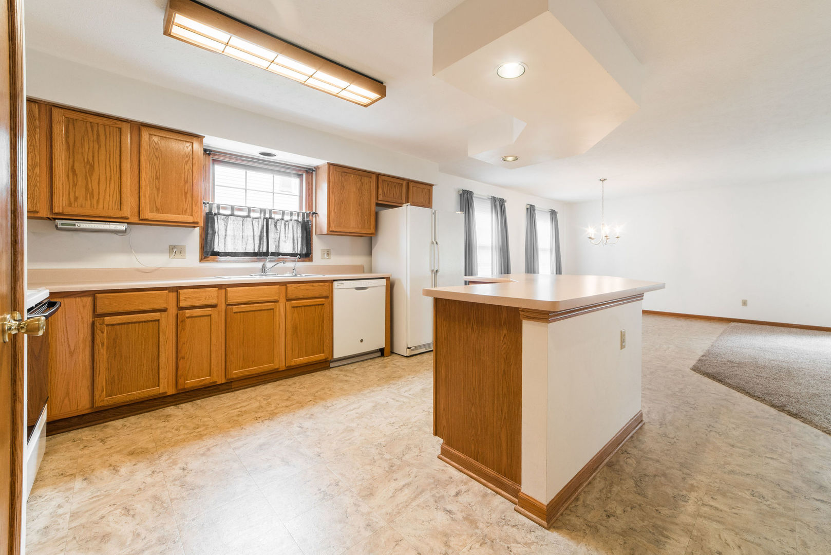 434 South Peace Road, Unit 434 Sycamore, IL 60178 - Photo 4 of 22 a kitchen with a sink and cabinets