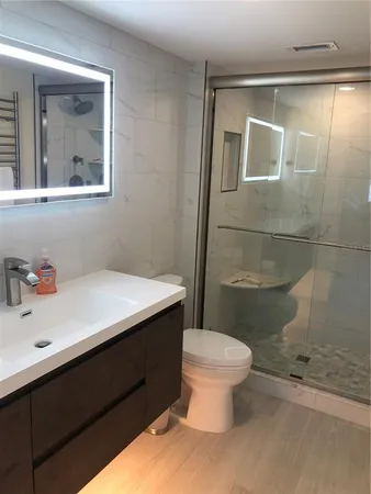 a bathroom with a sink and a toilet