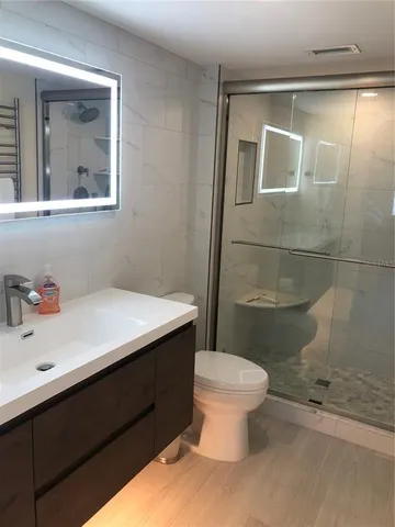 a bathroom with a sink and a toilet