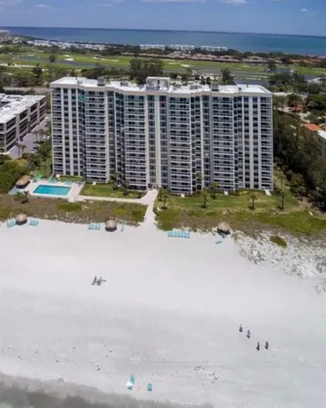 a view of a swimming pool and an outdoor space