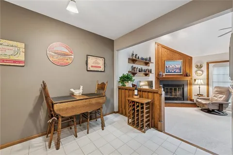 a view of a livingroom with furniture and a fireplace