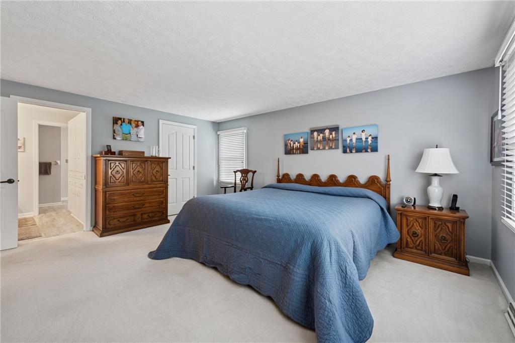 601 Timber Lane Sewickley, PA 15143 - Photo 22 of 45 a bedroom with a large bed and closet