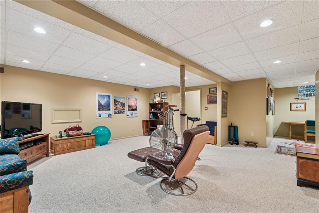 601 Timber Lane Sewickley, PA 15143 - Photo 30 of 45 a view of a livingroom with furniture and a flat screen tv