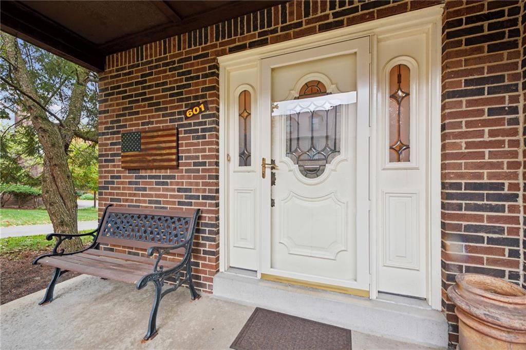 601 Timber Lane Sewickley, PA 15143 - Photo 3 of 45 a front view of a house with garden