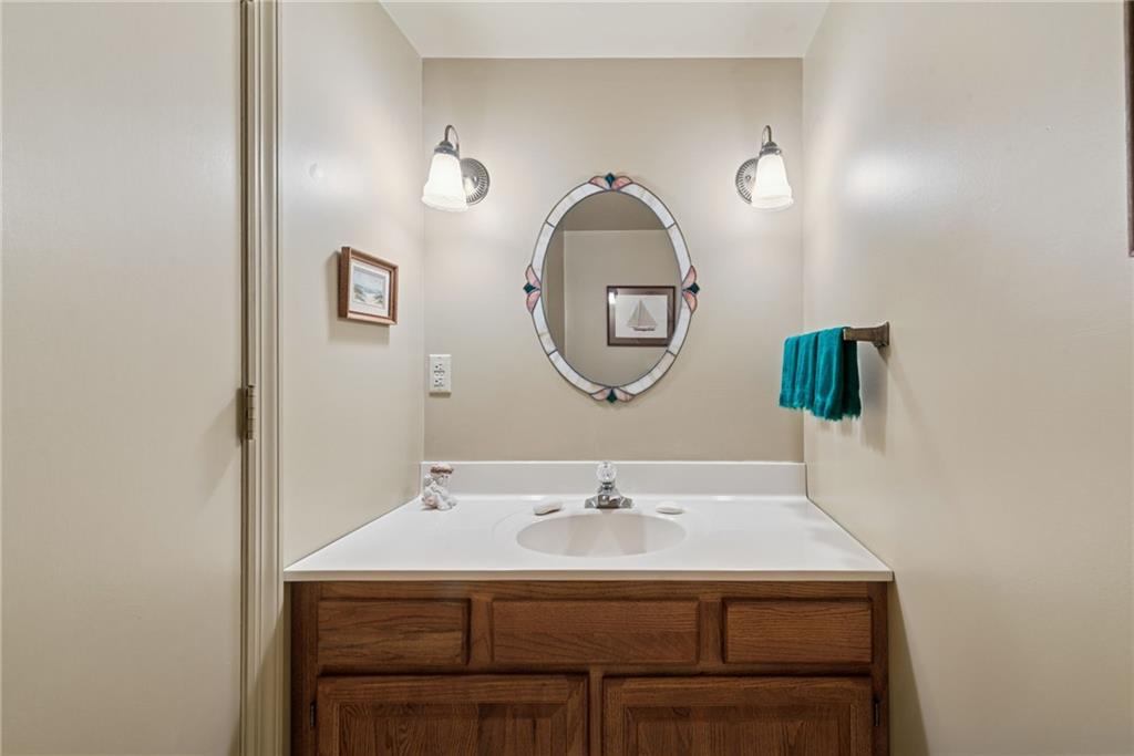 601 Timber Lane Sewickley, PA 15143 - Photo 32 of 45 a bathroom with a sink and a mirror