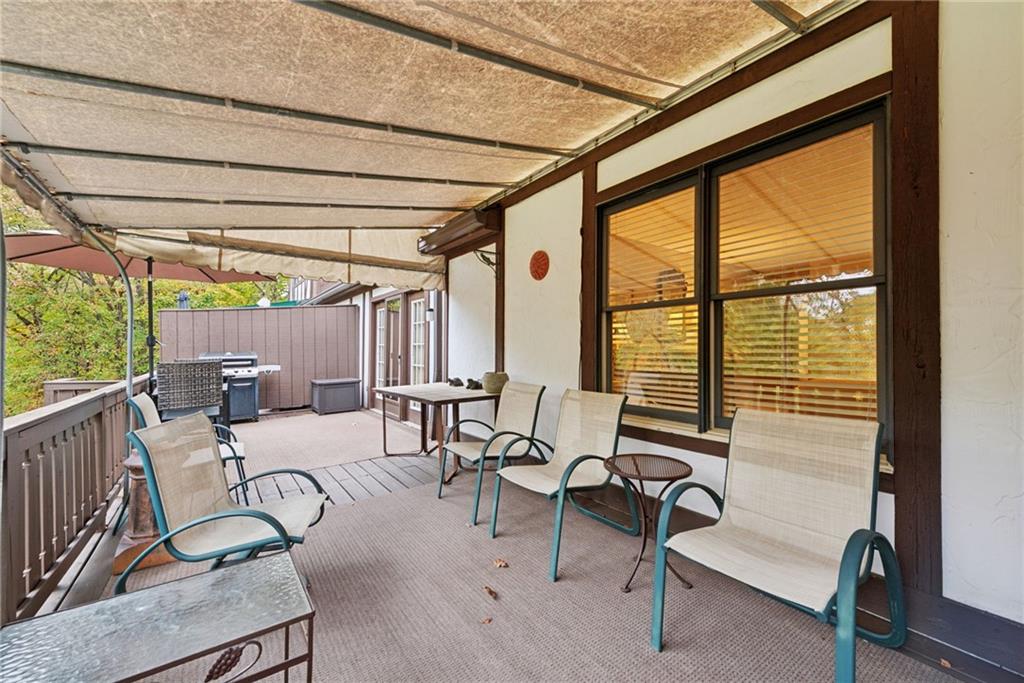 601 Timber Lane Sewickley, PA 15143 - Photo 34 of 45 a living room with furniture and floor to ceiling windows