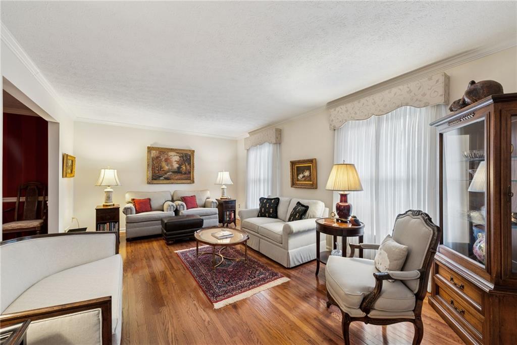 601 Timber Lane Sewickley, PA 15143 - Photo 5 of 45 a living room with furniture or couch and a wooden floor