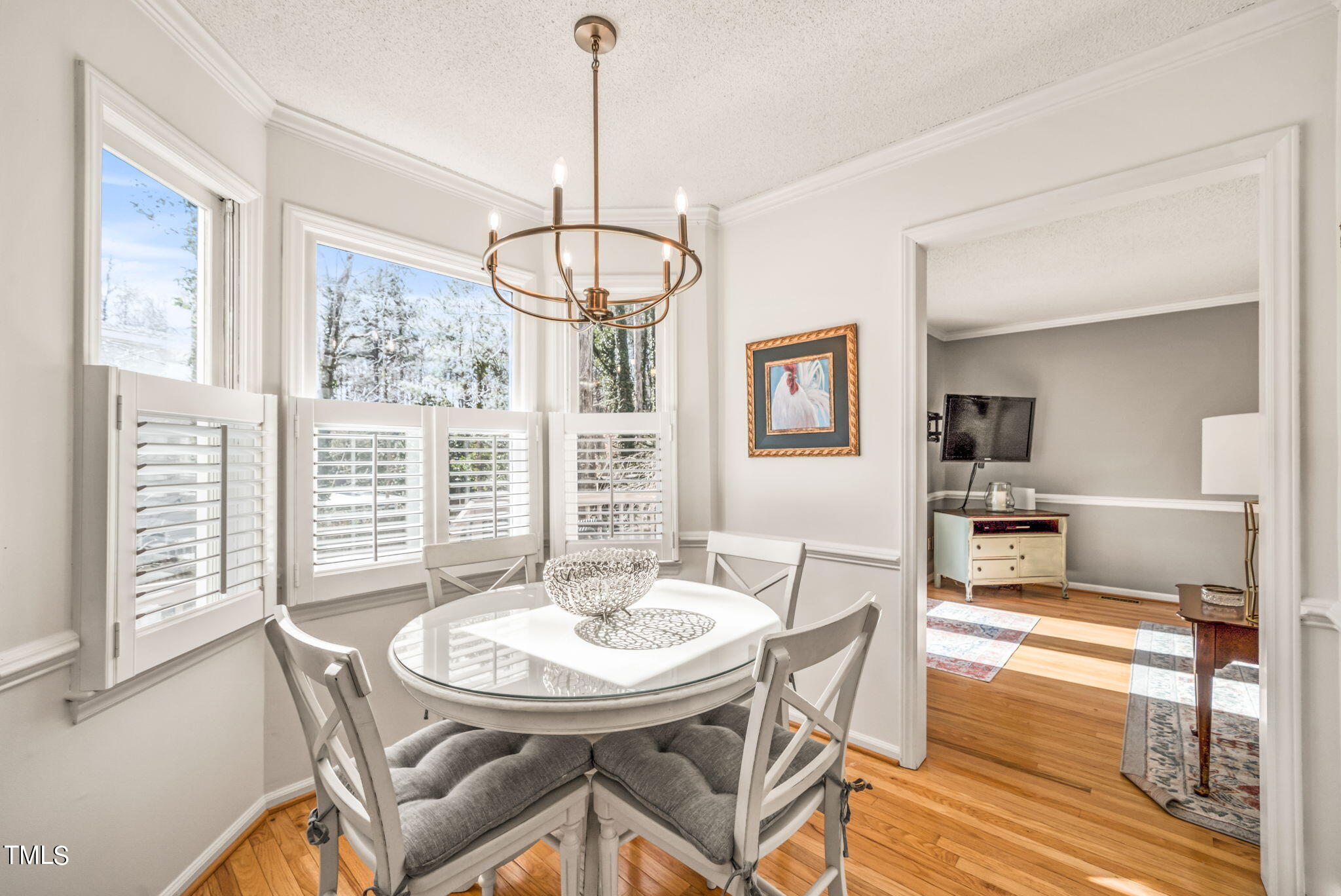4117 Cary Oaks Drive Apex, NC 27539 - Photo 13 of 38 a view of a dining room with furniture window and outside view