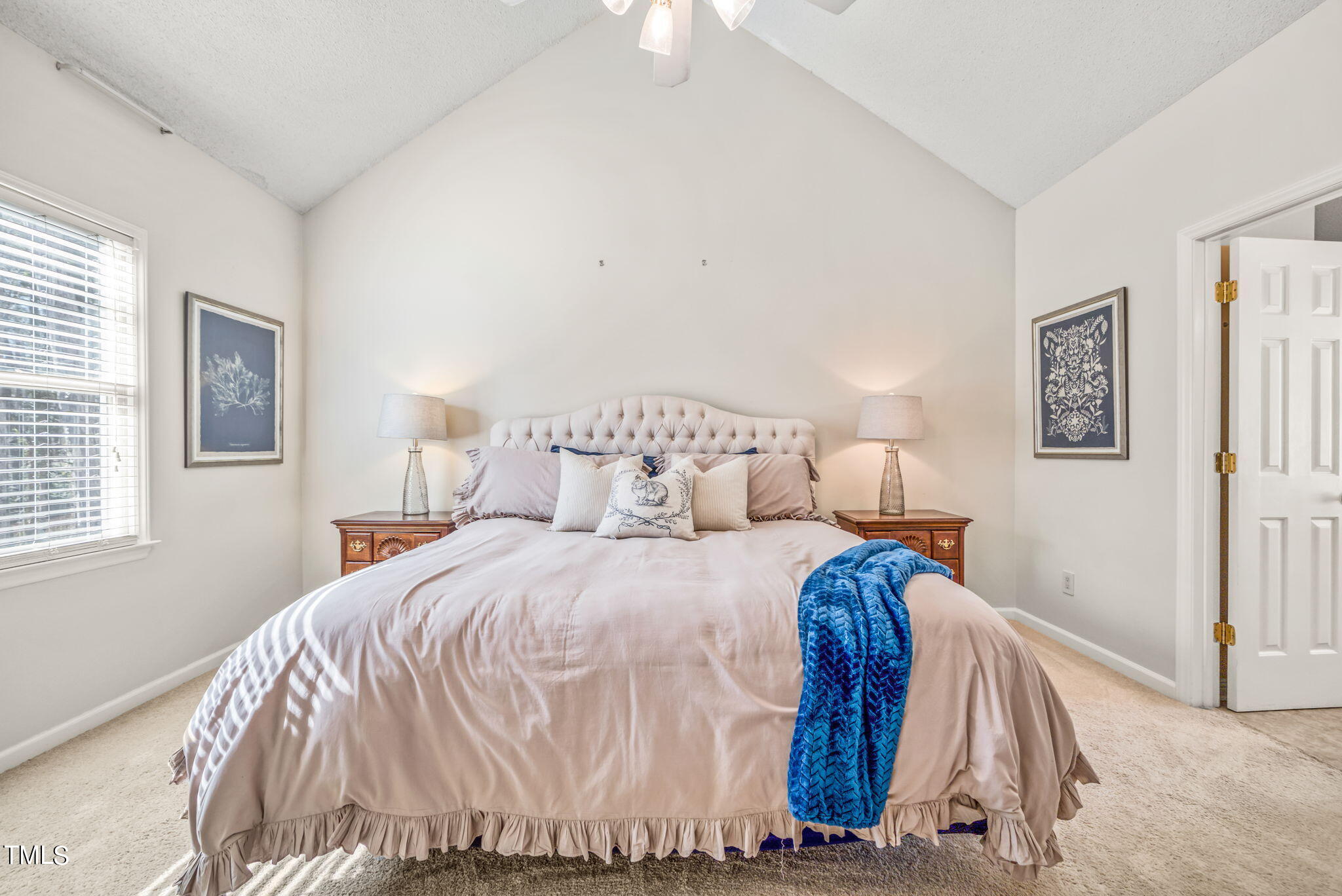 4117 Cary Oaks Drive Apex, NC 27539 - Photo 21 of 38 a bedroom with a beds and painting on the wall