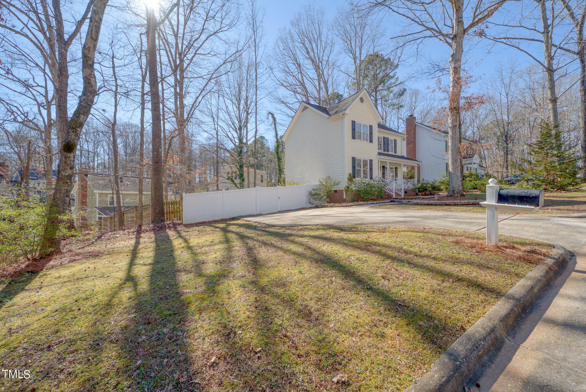 4117 Cary Oaks Drive Apex, NC 27539 - Photo 28 of 38 a view of a yard with plants and trees