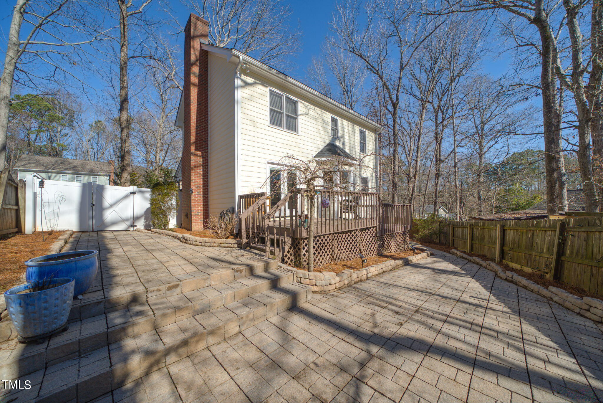 4117 Cary Oaks Drive Apex, NC 27539 - Photo 29 of 38 a view of a house with backyard and sitting area