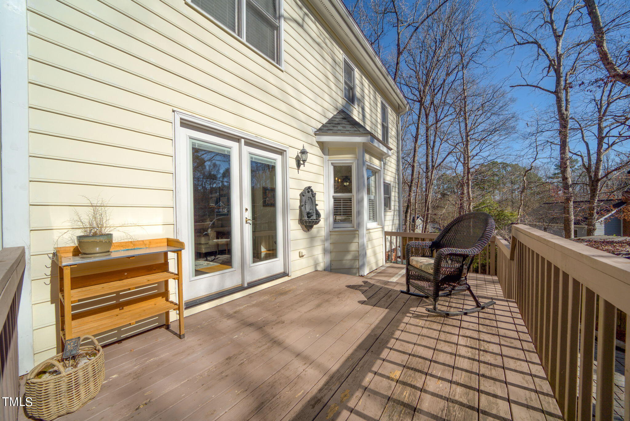 4117 Cary Oaks Drive Apex, NC 27539 - Photo 31 of 38 a balcony with furniture and a potted plant
