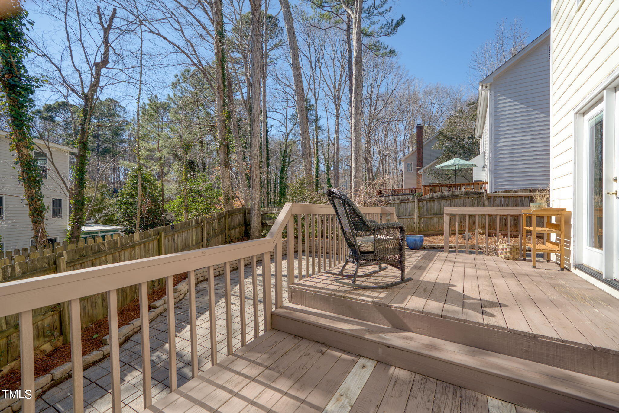 4117 Cary Oaks Drive Apex, NC 27539 - Photo 33 of 38 a view of balcony with two chairs and wooden fence