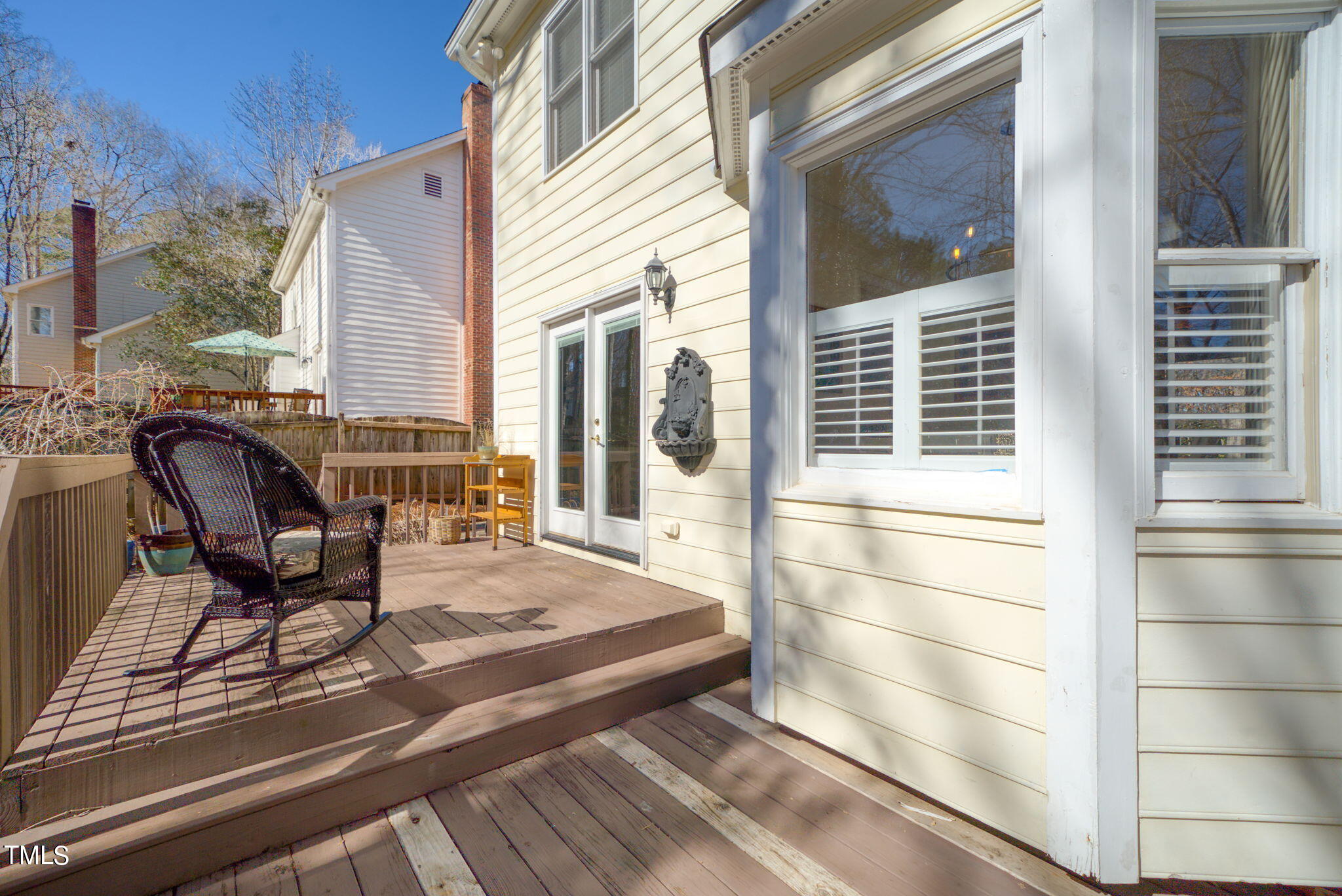 4117 Cary Oaks Drive Apex, NC 27539 - Photo 35 of 38 a balcony with table and chairs