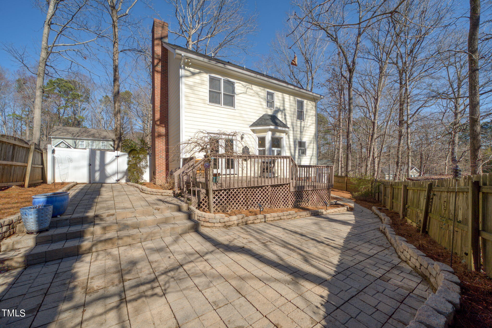 4117 Cary Oaks Drive Apex, NC 27539 - Photo 36 of 38 a view of a chairs and tables in the patio