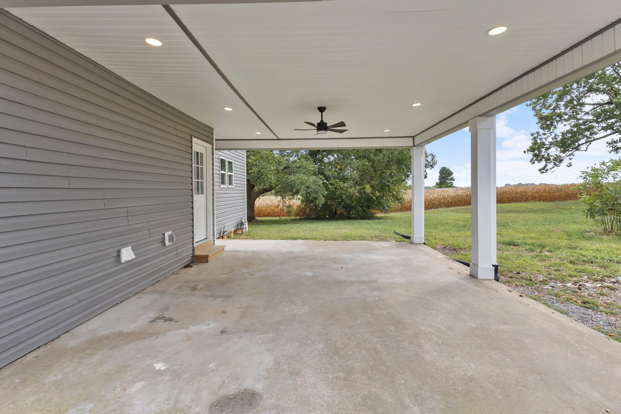 5178 East Robertson Road Cross Plains, TN 37049 - Photo 25 of 27 a view of a porch with wooden floor and fence