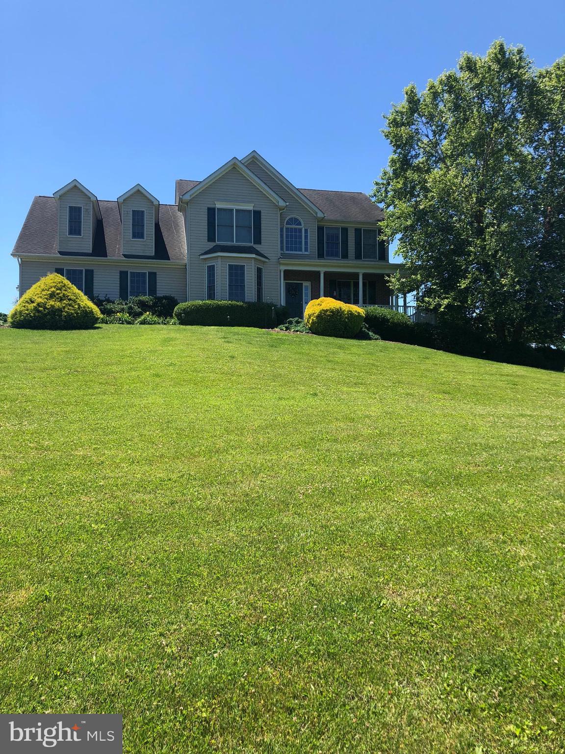 3075 Carrollton Road Finksburg, MD 21048 - Photo 1 of 1 a front view of a house with a yard and trees