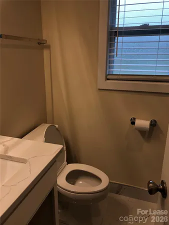 a bathroom with a sink and toilet