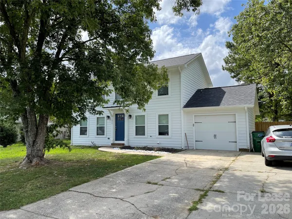 a house view with a outdoor space