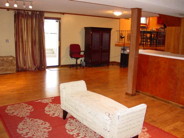 555 Rural Hill Road Nashville, TN 37217 - Photo 14 of 20 I REALLY LIKE THIS VIEW OF THE DEN/REC ROOM AS YOU CAN SEE THE SPACE & LAYOUT OF THE ROOM... SLIDING DOOR LEADS OUT TO A LARGE COVERED PATIO AREA... TO THE RIGHT YOU CAN SEE BACK INTO THE DINING ROOM